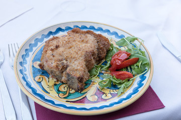 Cutlet with arugula