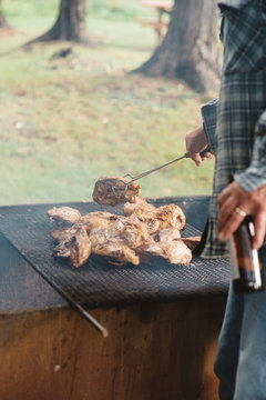 Chicken cooking at a summer barbecue