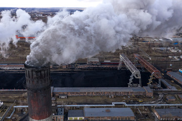 Coal fossil fuel Power Plant smokestacks emit carbon dioxide pollution