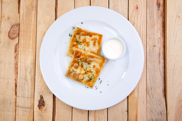 stuffed pancakes with sour cream