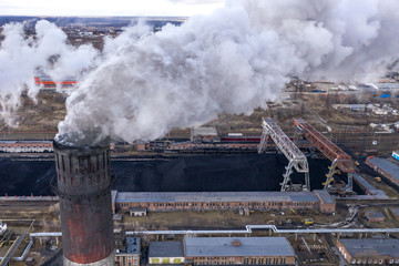Coal fossil fuel Power Plant smokestacks emit carbon dioxide pollution