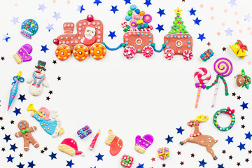 Merry Christmas greeting card with decorations. Santa, Christmas train with tree and sweets, snowman, reindeer and gifts