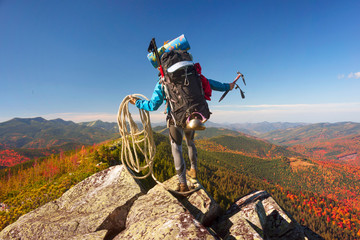 Trekking in the Mountains with a huge backpack