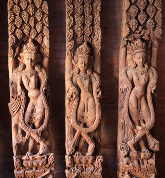 Ancient Nepalese wooden carving with Apsaras at the palace in Patan, Nepal