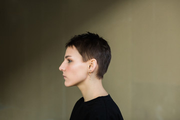 portrait of lesbian woman with short hair