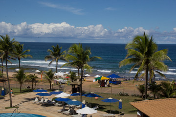 Obraz premium beach with chairs and umbrellas