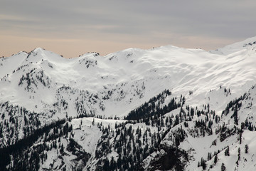 Fototapeta na wymiar Beautiful snow covered mountains at Mt. Baker Ski Resort, Washington, USA