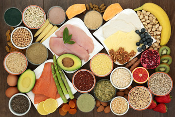 Health food for body builders high in protein including lean meat, salmon, dairy, dietary...