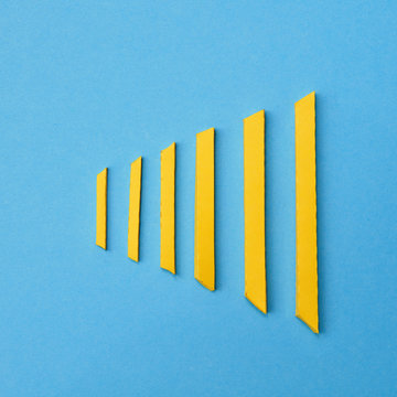 Fries in row made from paper