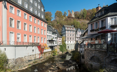 Fototapeta na wymiar Picturesque timber framed houses along the Rur River in the historic center of Monschau, Aachen, Germany