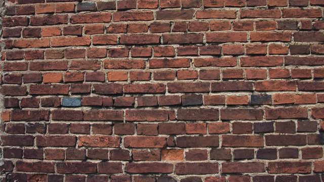 breaking red brick wall 4k