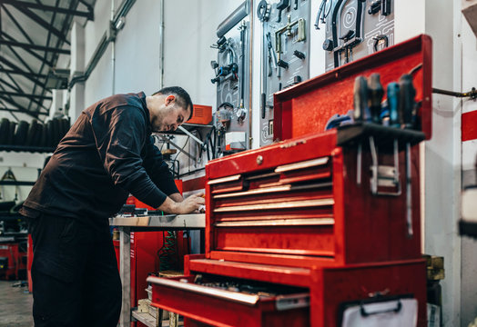 Mechanic working in the motorbike workshop