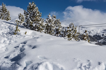 Landscape in the mountains, sunny day after heavy snowfall