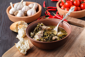 Chakapuli - Georgian stew.made from lamb chops or veal, onions, tarragon leaves, cherry plums or tkemali