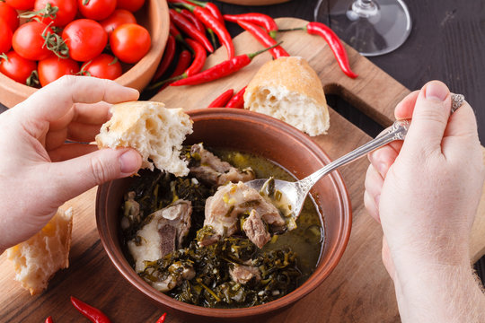 Man Eating Meat Soup