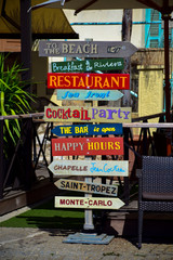 Signpost on the waterfront in the village of Villefranche-Sur-Mer on the French Riviera
