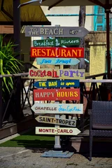 Wall murals Villefranche-sur-Mer, French Riviera Signpost on the waterfront in the village of Villefranche-Sur-Mer on the French Riviera
