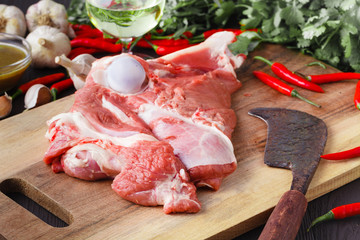 Pieces of fresh meat on kitchen table