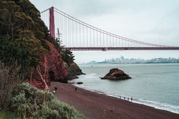 The Golden Gate Bridge from the coast of the Marin Headlands on a moody day