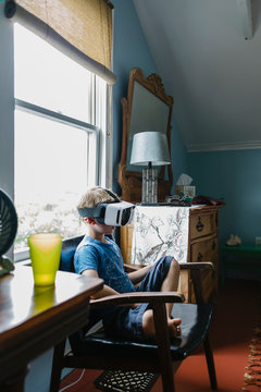 Young Boy Gettin' his VR Groove on