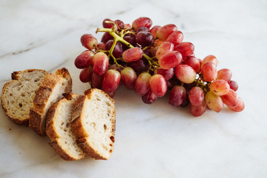 Ripe grapes on a marble kitchen table