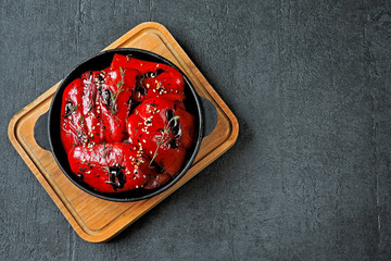 Red paprika grill in a cast iron skillet.