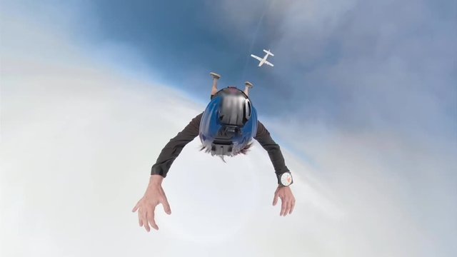 Video of a parachutist crossing the clouds in 360 view