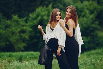 Fashion girls in a park