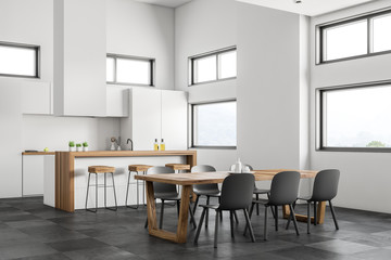 White kitchen and dining room side view