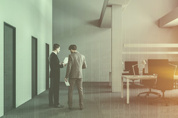 White industrial office with doors, people