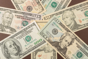 Background made from American dollars, dark base