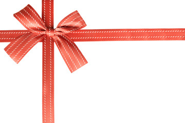 Red gift ribbon on a white box pattern in background. Gift box wrapping concept.