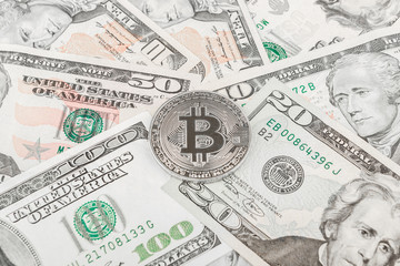 Background made from American dollars and bitcoin, dark base