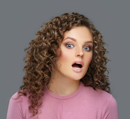 Portrait of confused young woman 