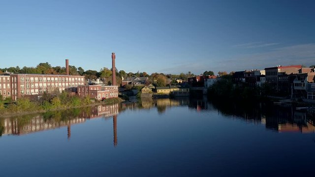 Aerial Drone - Fly Over Mirror Lake To Old Textile Factory in Exeter, New Hampshire 4K