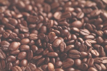 Aromatic roasted coffee  background close up