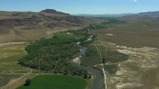 Aerial Rangeland river valley vegetation dry arable climate USA