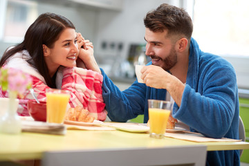 People in love drinking morning coffee