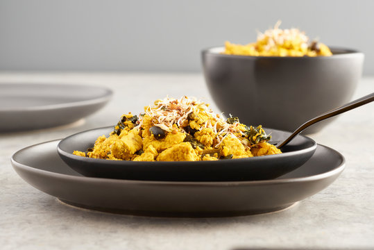 Scrambled Tofu on Black Plate