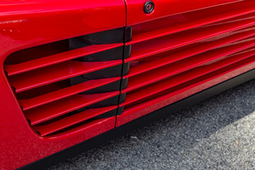 door on red sports car