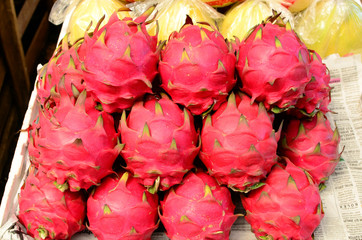 fresh dragon fruit symmetrically to attrack buyers at market stall