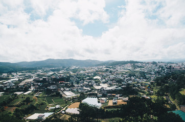 Dalat city, Vietnam, View of many houses from hill, The architecture of Dalat, Cityscape, Panorama landscape. a Lat (Dalat) is famous for its wide variety of flowers, vegetables and fruit.