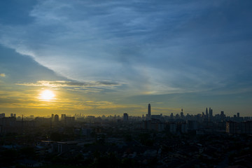 KUALA LUMPUR, MALAYSIA - 8th NOV 2018; Majestic sunrise over Kuala Lumpur, capital of Malaysia. Its modern skyline is dominated by the 451m tall KLCC, a pair of glass and steel clad skyscrapers.