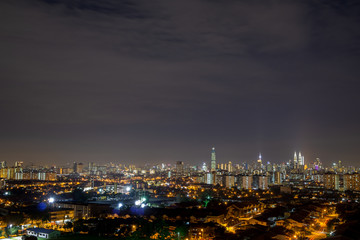 KUALA LUMPUR, MALAYSIA - 8th NOV 2018; Night view over Kuala Lumpur, capital of Malaysia. Its modern skyline is dominated by the 451m tall KLCC, a pair of glass and steel clad skyscrapers.