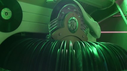 Close-up of the record changing internal gears of an antique jukebox