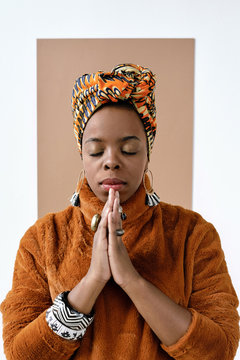 Praying African American woman