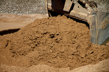 Moving soil at construction site