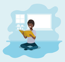 young black student sitting reading book