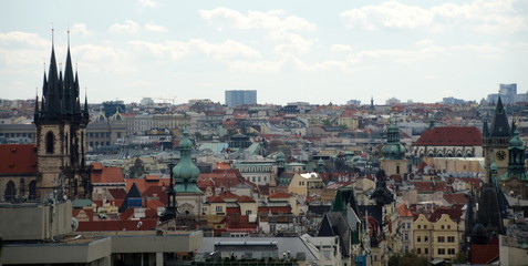 Looking at churches and towers of Prague Old town from Letna Park hill