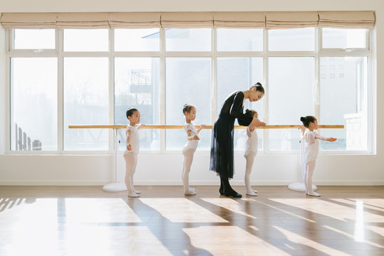 Ballet teaching teaching students in class